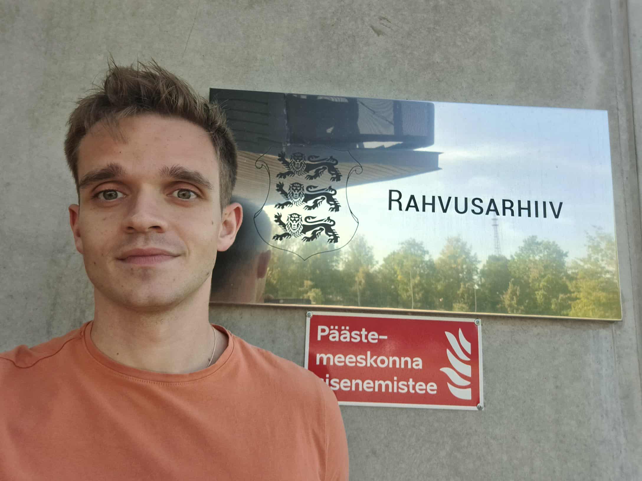 Robert Lipinski, a man in an orange shirt