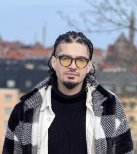 A man in a checked jacket